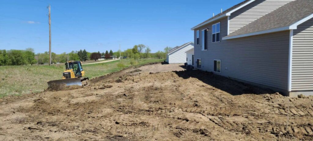 land grading tractor near house in corryton tn